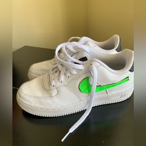 Limited edition Nike air forces . Neon green, white , & black. Sz: 5.5 Boys